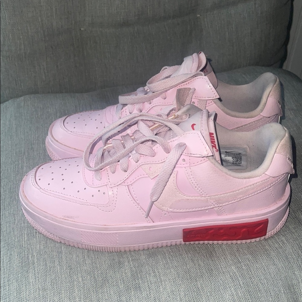 Nike Light Pink Sneakers with Red Detail